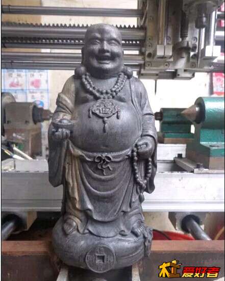 弥勒佛拖宝.jpg