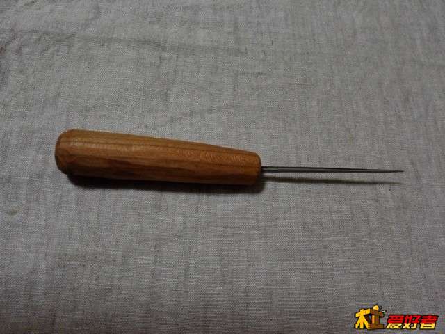 锥子。几块钱买的，改了个柄